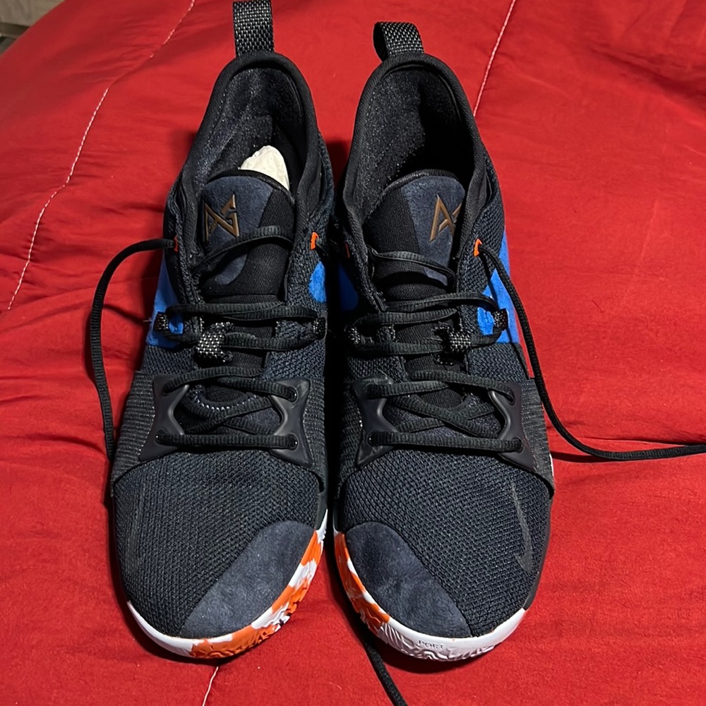 Paul George and a pair of slides